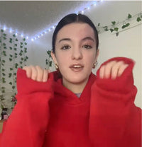 Customer wearing a Nermax hoodie
